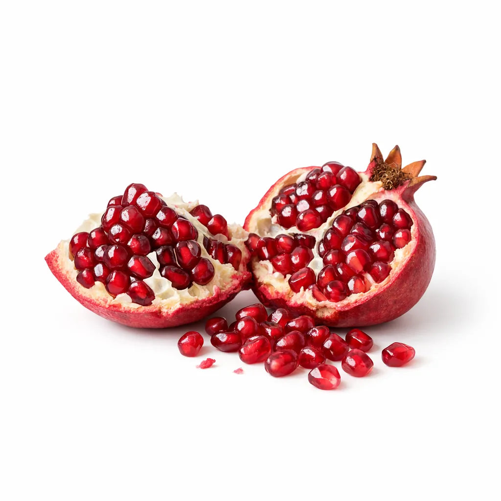 A pomegranate broken open with arils spilling out