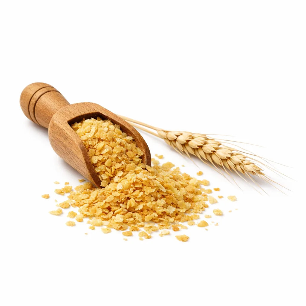 Wheat germ flakes and a wheat sprig