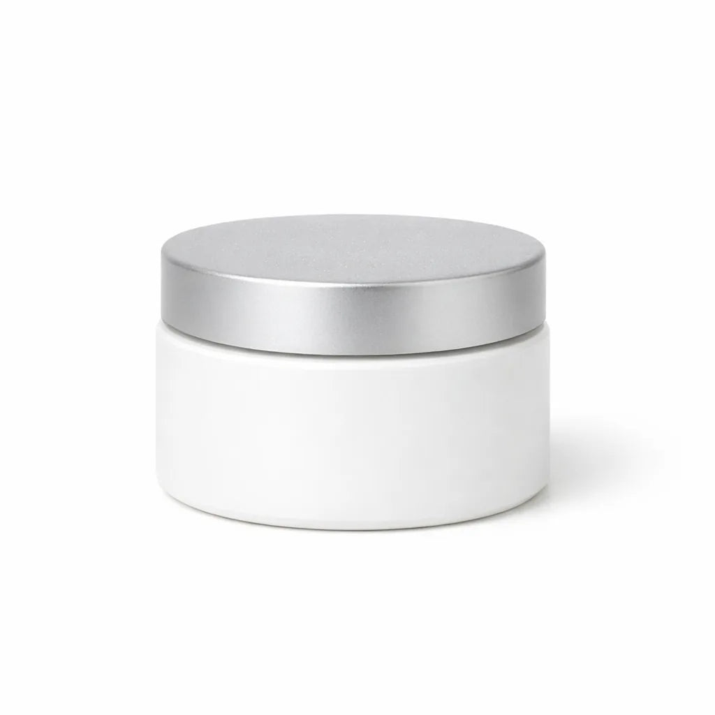 A generic wide tub of face cream under flat bathroom light