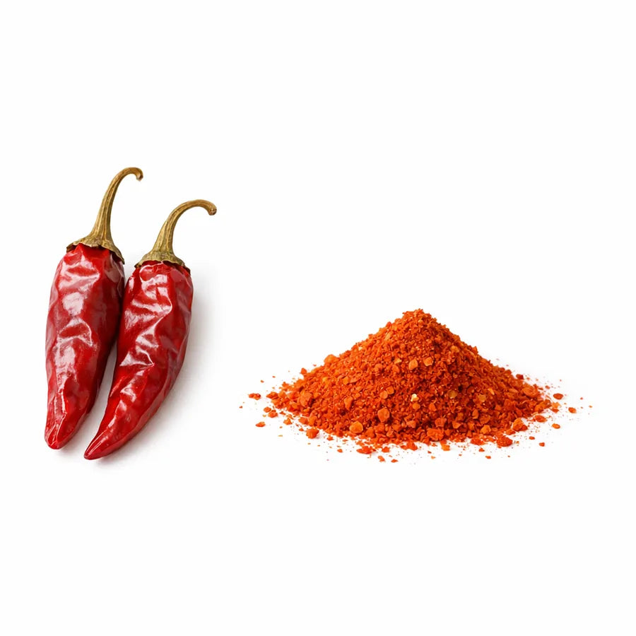 Whole and ground red cayenne peppers