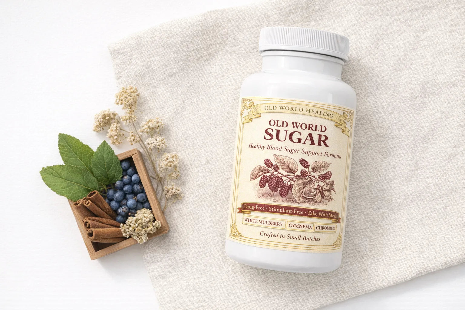 Old World Sugar with mulberry leaves, cinnamon bark, juniper berries and yarrow on cream linen